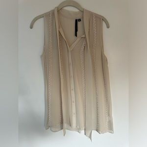 Brand new sleeveless semi-sheer button down top